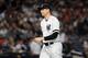 NEW YORK, NEW YORK - OCTOBER 15: Adam Ottavino #0 of the New York Yankees reacts as he walks to the dugout after being pulled during the seventh inning against the Houston Astros in game three of the American League Championship Series at Yankee Stadium o