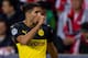 PRAGUE, CZECH REPUBLIC - OCTOBER 02: Achraf Hakimi of Borussia Dortmund celebrates after scoring his team's first goal during the UEFA Champions League group F match between Slavia Praha and Borussia Dortmund at Eden Stadium on October 2, 2019 in Prague,