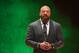 Triple H at a press conference announcing the match.