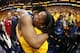 Mitchell celebrates with his mother, Nicole, after helping the Jazz upset the Thunder in the playoffs as a rookie.