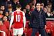 LONDON, ENGLAND - APRIL 11: Manager of Arsenal Unai Emery greets Mesut Ozil of Arsenal as he is substituted during the UEFA Europa League Quarter Final First Leg match between Arsenal and S.S.C. Napoli at Emirates Stadium on April 11, 2019 in London, Engl