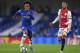 LONDON, ENGLAND - NOVEMBER 05: Willian of FC Chelsea and Noussair Mazraoui of Ajax Amsterdam battle for the ball during the UEFA Champions League group H match between Chelsea FC and AFC Ajax at Stamford Bridge on November 5, 2019 in London, United Kingdo