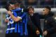 (From L) Inter Milan's Italian defender Danilo D'Ambrosio, Inter Milan's Croatian defender Marcelo Brozovic, Inter Milan's Italian head coach Antonio Conte and Inter Milan's Argentinian forward Lautaro Martinez celebrate at the end of the Italian Serie A