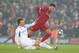 LIVERPOOL, ENGLAND - NOVEMBER 05: Alex Oxlade-Chamberlain of Liverpool is tackled by Sander Berge of KRC Genk during the UEFA Champions League group E match between Liverpool FC and KRC Genk at Anfield on November 05, 2019 in Liverpool, United Kingdom. (