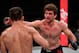 SINGAPORE, SINGAPORE - OCTOBER 26: (R-L) Ben Askren punches Demian Maia of Brazil in their welterweight bout during the UFC Fight Night event at Singapore Indoor Stadium on October 26, 2019 in Singapore. (Photo by Jeff Bottari/Zuffa LLC via Getty Images)