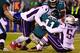 PHILADELPHIA, PA - NOVEMBER 17: Carson Wentz #11 of the Philadelphia Eagles is sacked by Kyle Van Noy #53 (L) of the New England Patriots and Dont'a Hightower #54 during the third quarter at Lincoln Financial Field on November 17, 2019 in Philadelphia, Pe