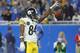 DETROIT, MI - OCTOBER 29: Antonio Brown #84 of the Pittsburgh Steelers drops the ball in celebration of a first down during the fourth quarter of the game against the Detroit Lions at Ford Field on October 29, 2017 in Detroit, Michigan. Pittsburgh Steeler
