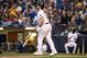 MILWAUKEE, WISCONSIN - SEPTEMBER 17: Mike Moustakas #11 of the Milwaukee Brewers hits a home run in the seventh inning against the San Diego Padres at Miller Park on September 17, 2019 in Milwaukee, Wisconsin. (Photo by Dylan Buell/Getty Images)