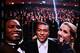 Former Ivorian forward Didier Drogba (L), Paris Saint-Germain's French forward Kylian Mbappe and French English tv host Sandy Heribert take a selfie picture during the Ballon d'Or France Football 2019 ceremony at the Chatelet Theatre in Paris on December