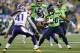 SEATTLE, WASHINGTON - DECEMBER 02: Running back Rashaad Penny #20 of the Seattle Seahawks carries the ball against the defense of the Minnesota Vikings at CenturyLink Field on December 02, 2019 in Seattle, Washington. (Photo by Otto Greule Jr/Getty Image