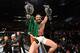 NEW YORK, NY - NOVEMBER 12: UFC lightweight and featherweight champion Conor McGregor of Ireland celebrates after defeating Eddie Alvarez in their UFC lightweight championship fight during the UFC 205 event at Madison Square Garden on November 12, 2016 i