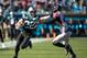 CHARLOTTE, NC - NOVEMBER 17: Christian McCaffrey #22 of the Carolina Panthers straight-arms Deion Jones #45 of the Atlanta Falcons during a run during a game between Atlanta Falcons and Carolina Panthers at Bank of America Stadium on November 17, 2019 in