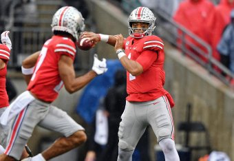 COLUMBUS, OH - OCTOBER 26:  Quarterback Justin Fields #1 of the Ohio State Buckeyes throws against the Wisconsin Badgers at Ohio Stadium on October 26, 2019 in Columbus, Ohio.  (Photo by Jamie Sabau/Getty Images)