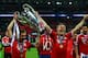 LONDON, ENGLAND - MAY 25: Philipp Lahm and Bastian Schweinsteiger of Bayern Muenchen hold the trophy after winning the UEFA Champions League final match against Borussia Dortmund at Wembley Stadium on May 25, 2013 in London, United Kingdom. (Photo by Al