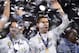 Real Madrid's Portuguese striker Cristiano Ronaldo (R) raises a hand after Real Madrid won the UEFA Champions League final football match between Juventus and Real Madrid at The Principality Stadium in Cardiff, south Wales, on June 3, 2017. / AFP PHOTO /