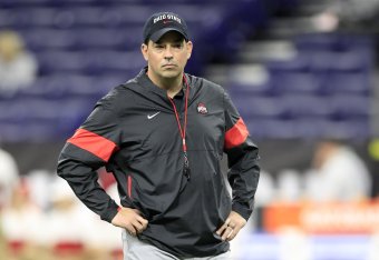 INDIANAPOLIS, INDIANA - DECEMBER 07: Ryan Day the head coach of the Ohio State Buckeyes watches his team practice before the start of the BIG Ten Football Championship game against the Wisconsin Badgers at Lucas Oil Stadium on December 07, 2019 in Indiana