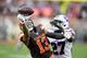 CLEVELAND, OHIO - NOVEMBER 10: Wide receiver Odell Beckham #13 of the Cleveland Browns drops a pass while under during pressure from cornerback Tre'Davious White #27 of the Buffalo Bills the second half at FirstEnergy Stadium on November 10, 2019 in Cleve