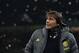 MILAN, ITALY - DECEMBER 10: FC Internazionale coach Antonio Conte looks on during the UEFA Champions League group F match between FC Internazionale and FC Barcelona at Giuseppe Meazza Stadium on December 10, 2019 in Milan, Italy. (Photo by Emilio Andreo