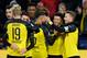 DORTMUND, GERMANY - DECEMBER 10: (BILD ZEITUNG OUT) Jadon Sancho of Borussia Dortmund celebrates after scoring his team's first goal with team mates during the UEFA Champions League group F match between Borussia Dortmund and Slavia Praha at Signal Iduna