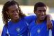 Brazilian soccer striker Ronaldinho Gaucho (L) and teammate Kleberson smile during a training session at the Centre de Formation l'Etrat in Saint-Etienne, 20 June 2003. Brazil will face USA 21June 2003 for the soccer Confederation Cup. AFP PHOTO ANTONI
