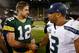 GREEN BAY, WI - SEPTEMBER 20: Quarterbacks Aaron Rodgers #12 of the Green Bay Packers and Russell Wilson #3 of the Seattle Seahawks shake hands following the NFL game at Lambeau Field on September 20, 2015 in Green Bay, Wisconsin. The Packers defeated t