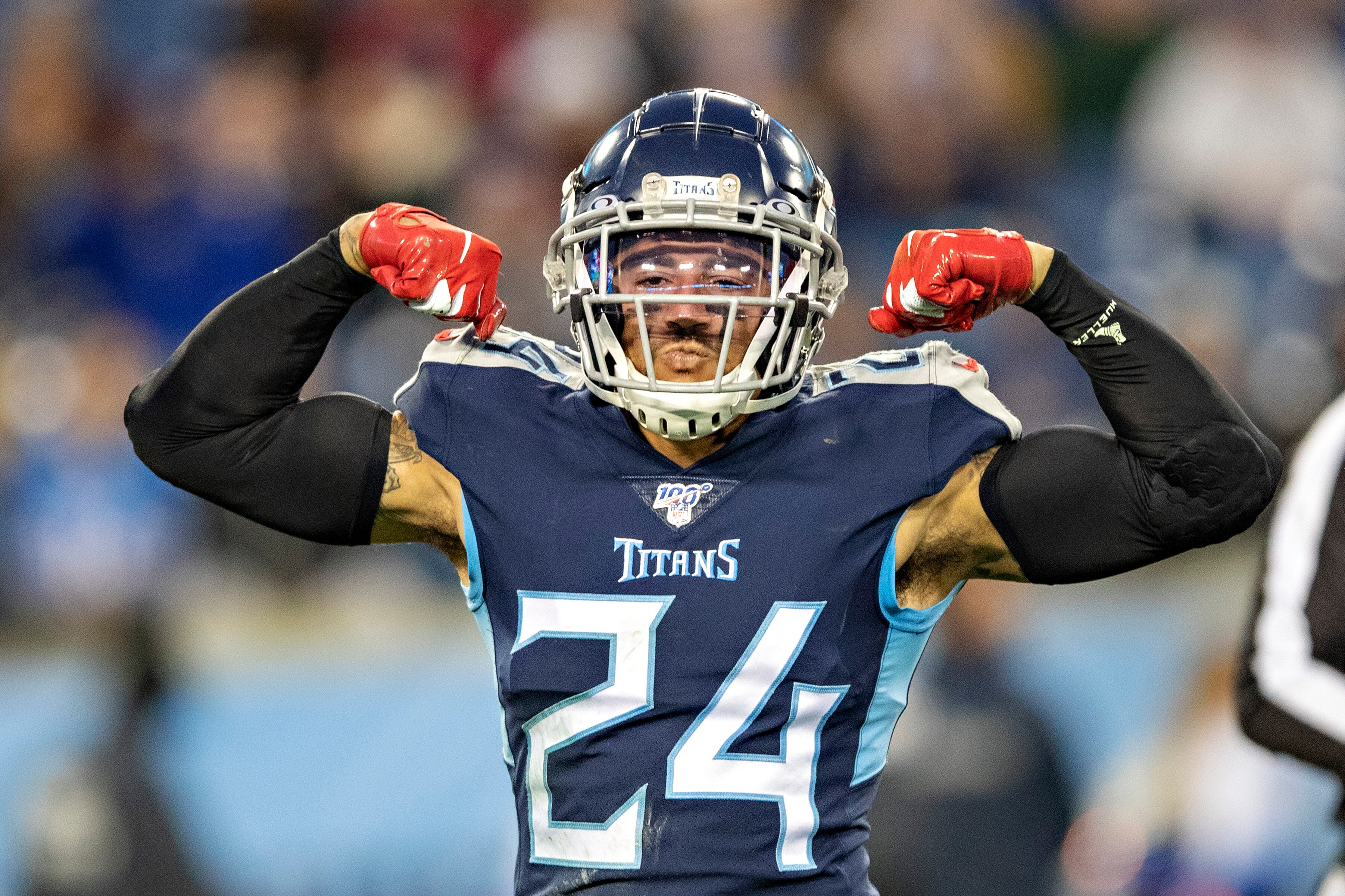 NASHVILLE, TN - NOVEMBER 24: Kenny Vaccaro #24 of the Tennessee Titans flexes his muscles during the second half of a game against the Jacksonville Jaguars at Nissan Stadium on November 24, 2019 in Nashville, Tennessee. The Titans defeated the Jaguars 