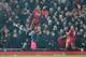 Liverpool's Dutch defender Virgil van Dijk (L) celebrates scoring the opening goal during the English Premier League football match between Liverpool and Manchester United at Anfield stadium in Liverpool, north west England on January 19, 2020. (Photo by
