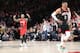 PORTLAND, OREGON - JANUARY 29: Damian Lillard #0 of the Portland Trail Blazers hypes up the crowd alongside Russell Westbrook #0 of the Houston Rockets in the fourth quarter during their game at Moda Center on January 29, 2020 in Portland, Oregon. NOTE TO