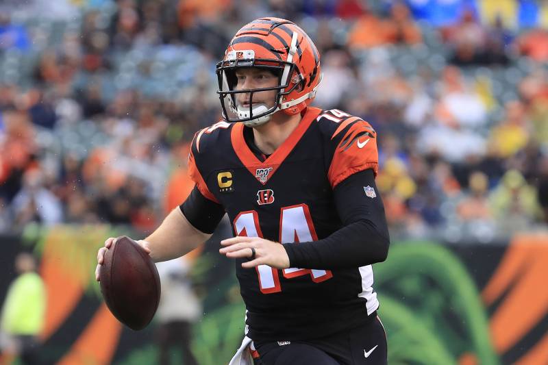 CINCINNATI, OHIO - DECEMBER 29:   Andy Dalton #14 of the Cincinnati Bengals runs for a touchdown during the game against the Cleveland Browns at Paul Brown Stadium on December 29, 2019 in Cincinnati, Ohio. (Photo by Andy Lyons/Getty Images)