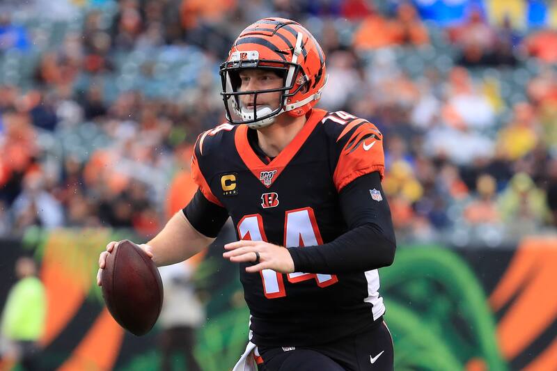CINCINNATI, OHIO - DECEMBER 29: Andy Dalton #14 of the Cincinnati Bengals runs for a touchdown during the game against the Cleveland Browns at Paul Brown Stadium on December 29, 2019 in Cincinnati, Ohio. (Photo by Andy Lyons/Getty Images)