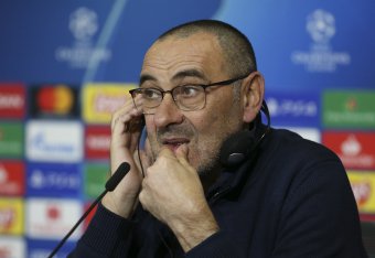 LYON, FRANCE - FEBRUARY 26: Coach of Juventus Maurizio Sarri answers to the media during the post-match press conference following the UEFA Champions League round of 16 first leg match between Olympique Lyonnais (OL) and Juventus at Groupama Stadium on Fe