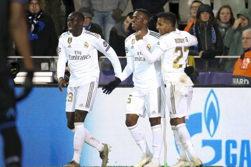 BRUGGE, BELGIUM - DECEMBER 11: Vinicius Junior of Real Madrid celebrates his goal with Ferland Mendy and Rodrygo during the UEFA Champions League group A match between Club Brugge KV and Real Madrid at Jan Breydel Stadium on December 11, 2019 in Brugge, B