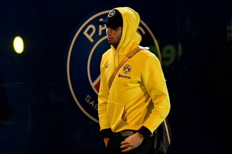 Dortmund's Moroccan defender Achraf Hakimi arrives to attend the UEFA Champions League round of 16 second leg football match between Paris Saint-Germain (PSG) and Borussia Dortmund, outside the Parc des Princes stadium, in Paris, on March 11, 2020. - The 