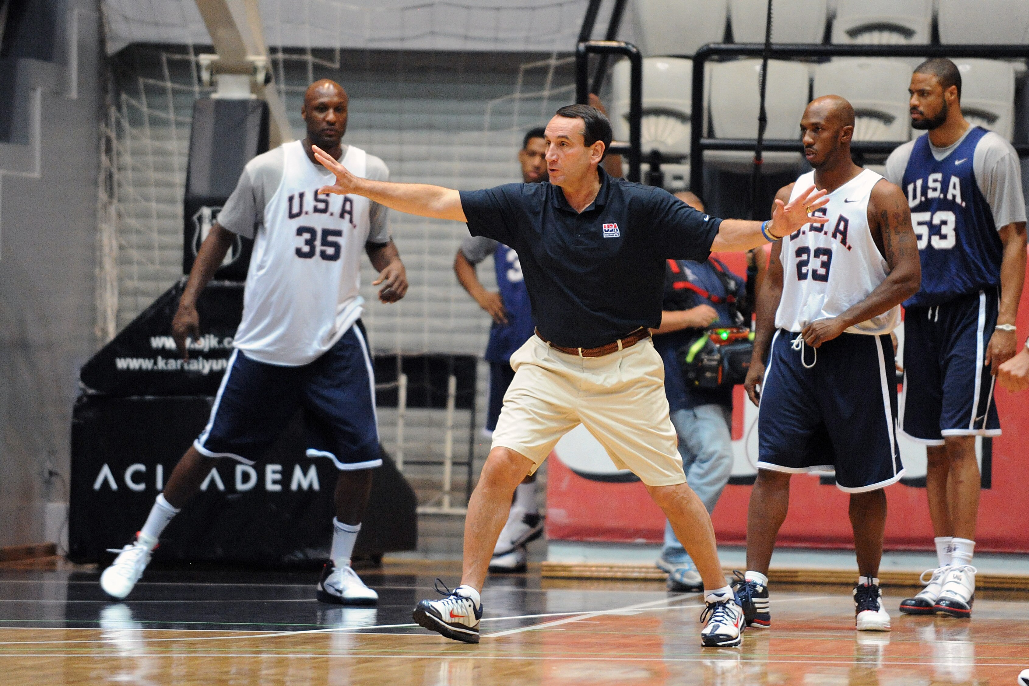 ISTANBUL, TURKEY - SEPTEMBER 5: Head coach Mike Krzyzewski works on defense with Lamar Odom #35, Chauncey Billups #23 and Tyson Chandler #53 of the USA Senior Men's National Team during practice at the 2010 World Championships of Basketball on September 5