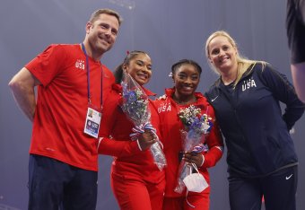 Laurent (left) and Cecile (right) Landi accompany Chiles and Biles at the Olympics Trials in June.