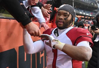 CHICAGO, ILLINOIS - DECEMBER 05:  Quarterback Kyler Murray #1 of the Arizona Cardinals celebrates with fans after Arizona defeated the Chicago Bears 33-22 at Soldier Field on December 05, 2021 in Chicago, Illinois.  (Photo by Jamie Sabau/Getty Images)