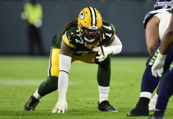 GREEN BAY, WISCONSIN - NOVEMBER 14: Billy Turner #77 of the Green Bay Packers in action against the Seattle Seahawks at Lambeau Field on November 14, 2021 in Green Bay, Wisconsin. (Photo by Patrick McDermott/Getty Images)