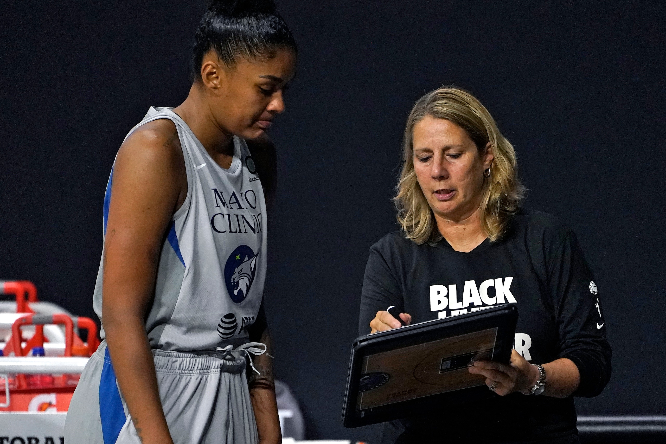 Minnesota Lynx head coach Cheryl Reeve, right, advises one of her players. Reeve has been vocal about the WNBA needing more female head coaches.