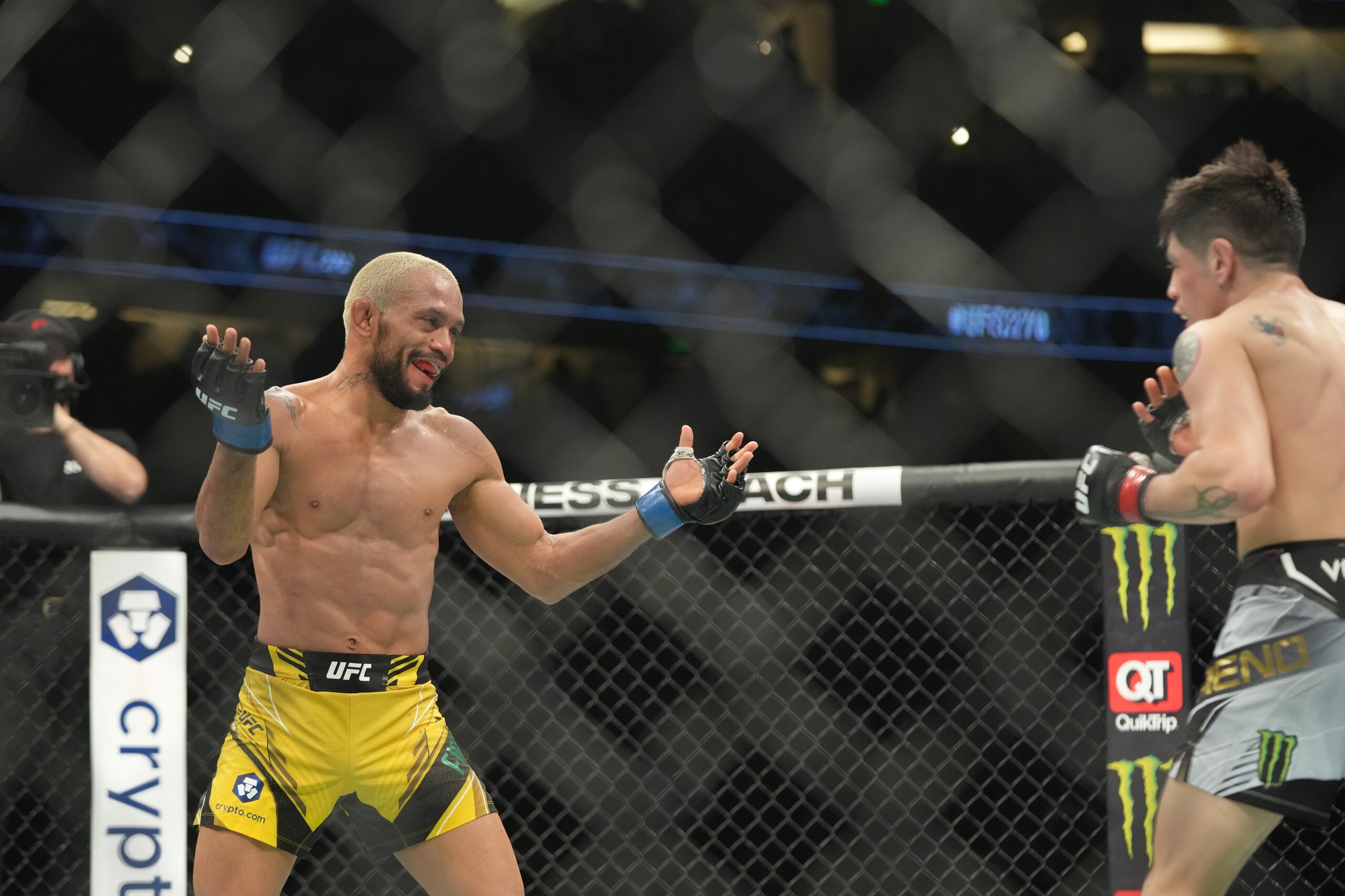 ANAHEIM, CA - JANUARY 22: (R-L) Brandon Moreno battles Deiveson Figueiredo in their Flyweight championship fight during UFC 270 on January 22, 2022, at Honda Center in Anaheim, California. (Photo by Louis Grasse/PxImages/Icon Sportswire via Getty Images)