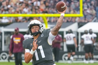 ORLANDO, FL - SEPTEMBER 11: UCF Knights quarterback Dillon Gabriel (11) warming up before the football game between the UCF Knights and Bethune-Cookman Wildcats on September 11th, 2022 at Bright House Networks Stadium in Orlando, FL. (Photo by Andrew Bers