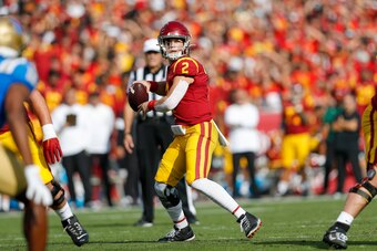 LOS ANGELES, CA - NOVEMBER 20: USC Trojans quarterback Jaxson Dart (2) looks to throw the ball during a college football game between the UCLA Bruins and the USC Trojans on November 20, 2021, at United Airlines Field at The Los Angeles Memorial Coliseum i
