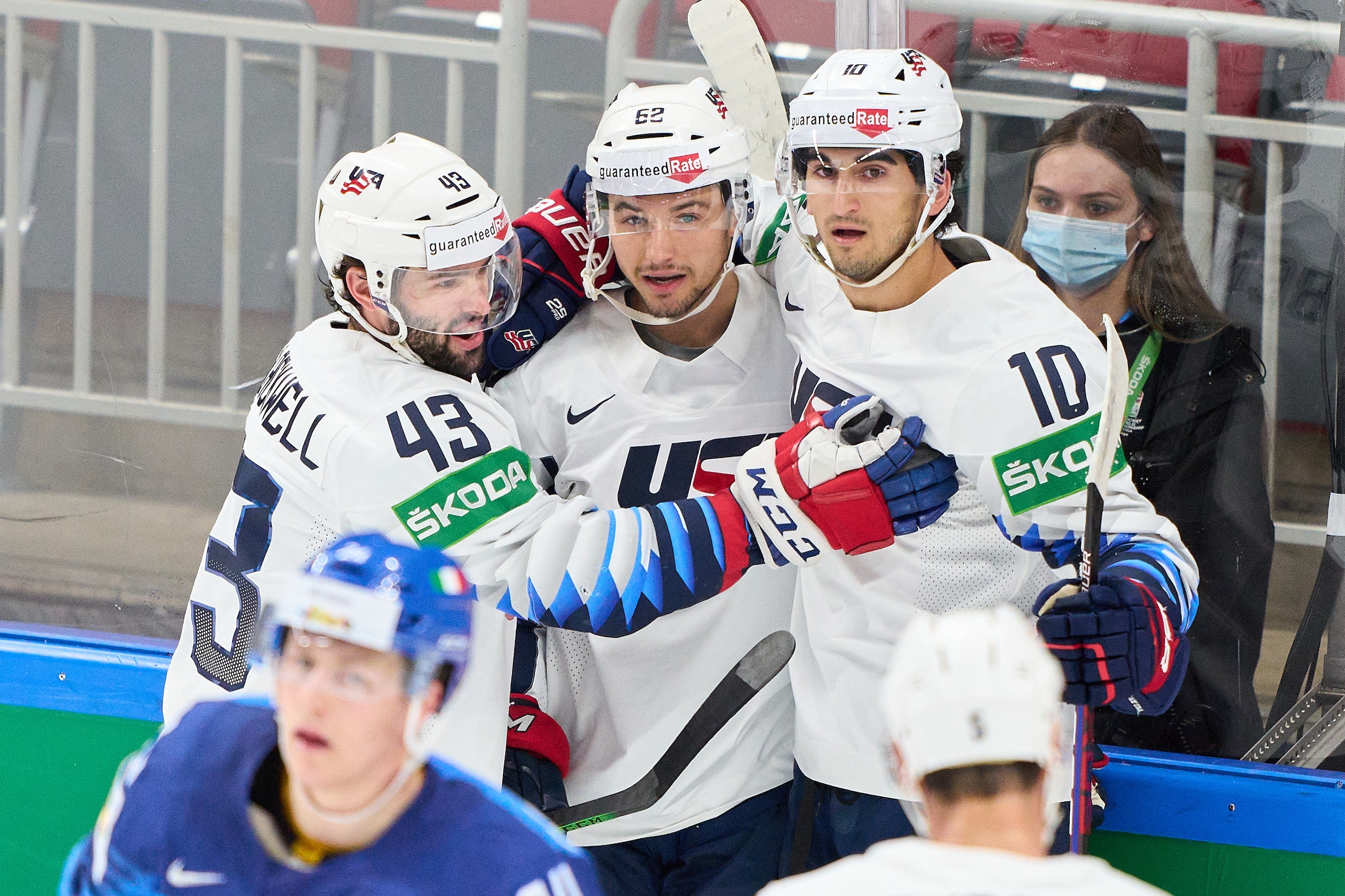 RIGA, LATVIA - JUNE 01: Kevin Labanc (M) #62 of the United States celebrates scoring for 0-2 and celebrates his goal with Matty Beniers (R) #10 and Colin Blackwell (L) #43 of the United States during the 2021 IIHF Ice Hockey World Championship group stage