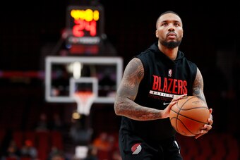 PORTLAND, OREGON - FEBRUARY 08: Damian Lillard #0 of the Portland Trail Blazers warms up before the game against the Orlando Magic at Moda Center on February 08, 2022 in Portland, Oregon. NOTE TO USER: User expressly acknowledges and agrees that, by downl