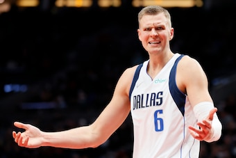 PORTLAND, OREGON - JANUARY 26: Kristaps Porzingis #6 of the Dallas Mavericks reacts during the third quarter against the Portland Trail Blazers at Moda Center on January 26, 2022 in Portland, Oregon. NOTE TO USER: User expressly acknowledges and agrees th