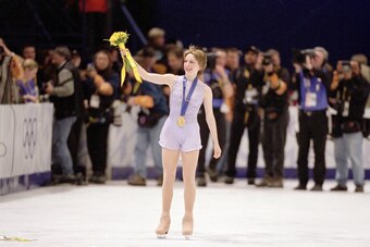 Figure Skating: 2002 Winter Olympics: USA Sarah Hughes victorious, wearing gold medal after Women's Free Program at Salt Lake Ice Center. 
Salt Lake City, UT 2/21/2002
CREDIT: Simon Bruty (Photo by Simon Bruty /Sports Illustrated via Getty Images) (Set Nu