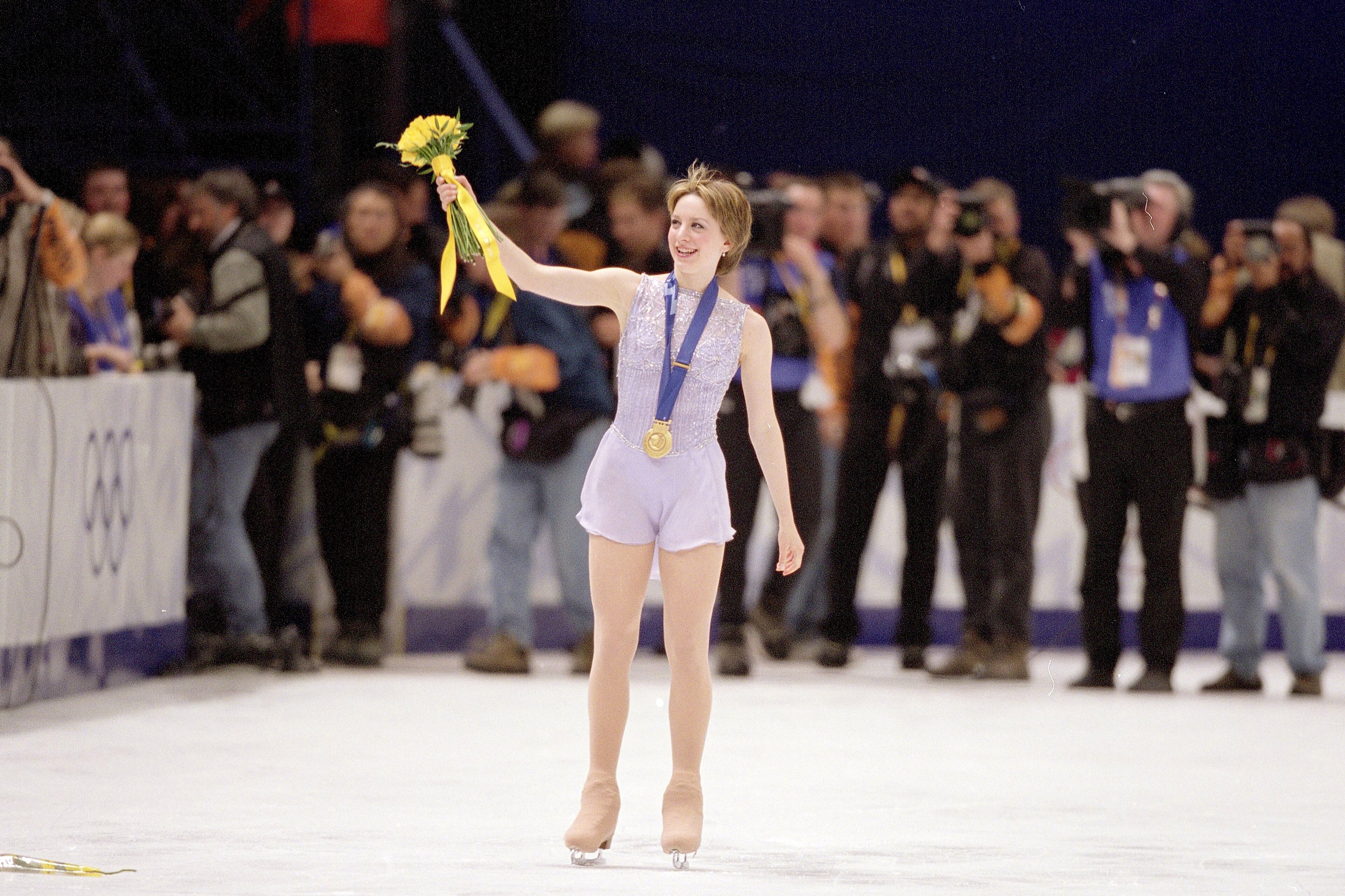 Figure Skating: 2002 Winter Olympics: USA Sarah Hughes victorious, wearing gold medal after Women's Free Program at Salt Lake Ice Center. 
Salt Lake City, UT 2/21/2002
CREDIT: Simon Bruty (Photo by Simon Bruty /Sports Illustrated via Getty Images) (Set Nu
