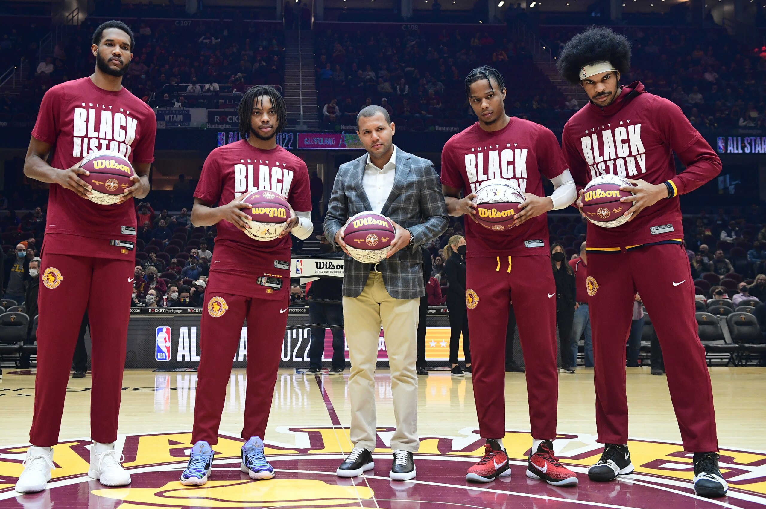 CLEVELAND, OH - FEBRUARY 9: Evan Mobley #4, Darius Garland #10, Isaac Okoro #35 and Jarrett Allen #31 of the Cleveland Cavaliers are acknowledged by fans to be represented during NBA All-Star Weekend on February 9, 2022 at Rocket Mortgage FieldHouse in Cl