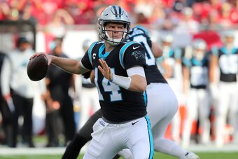 TAMPA, FL - JANUARY 9: Carolina Panthers Quarterback Sam Darnold (14) looks for an open receiver during the regular season game between the Carolina Panthers and the Tampa Bay Buccaneers on January 9, 2022 at Raymond James Stadium in Tampa, Florida. (Phot