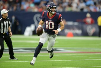 HOUSTON, TX - JANUARY 09: Houston Texans QB Davis Mills looks for an open man during an NFL game between the Houston Texans and the Tennessee Titans on January 9, 2022 at NRG Stadium in Houston, TX. (Photo by John Rivera/Icon Sportswire via Getty Images)