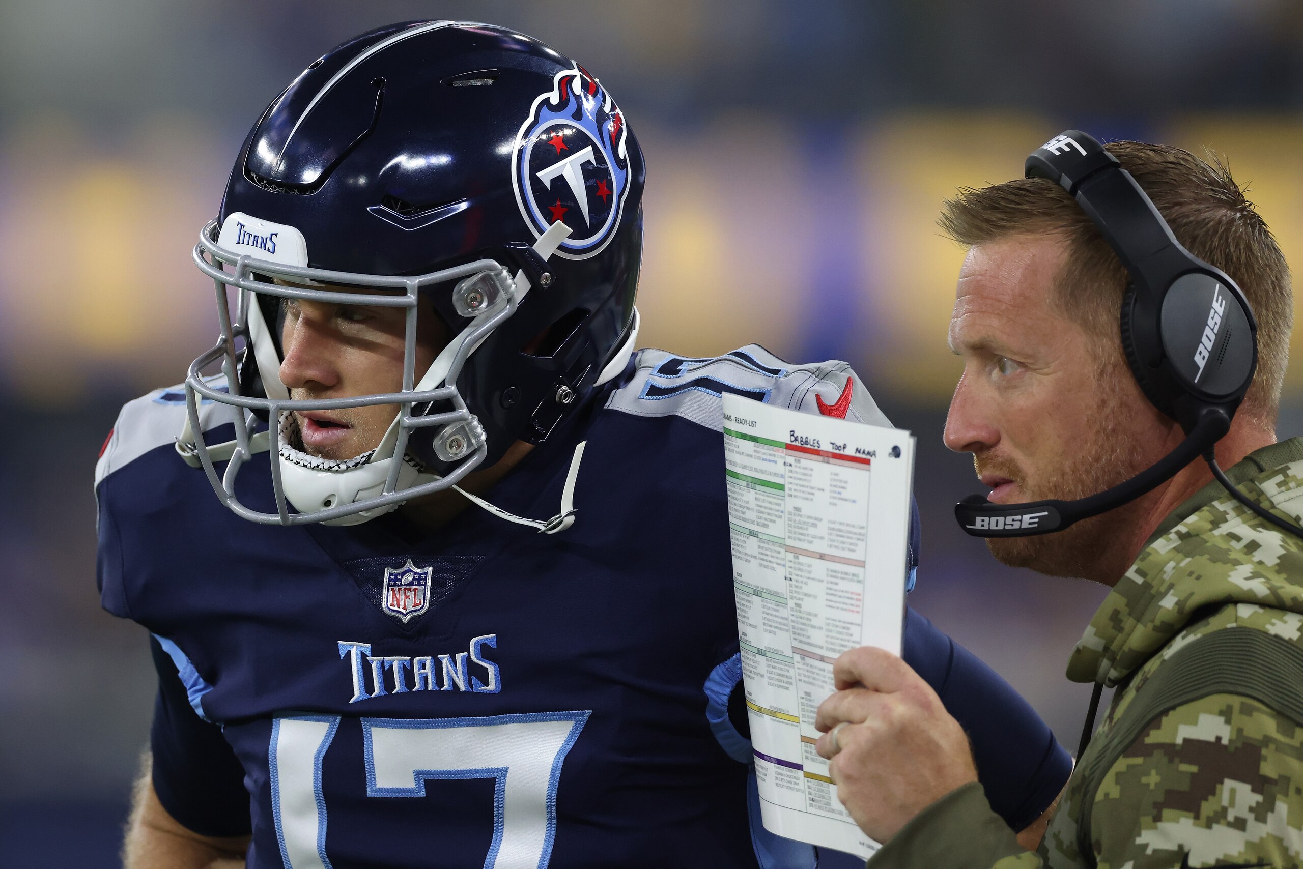 INGLEWOOD, CALIFORNIA - NOVEMBER 07:  Offensive coordinator Todd Downing of the Tennessee Titans converses with Ryan Tannehill #17 against the Los Angeles Rams during the first quarter at SoFi Stadium on November 07, 2021 in Inglewood, California. (Photo 